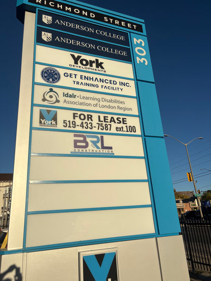 EXTERIOR PYLON SIGN REFACING